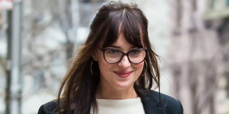 Dakota Johnson’s jeans, blazer and boots combo is timeless