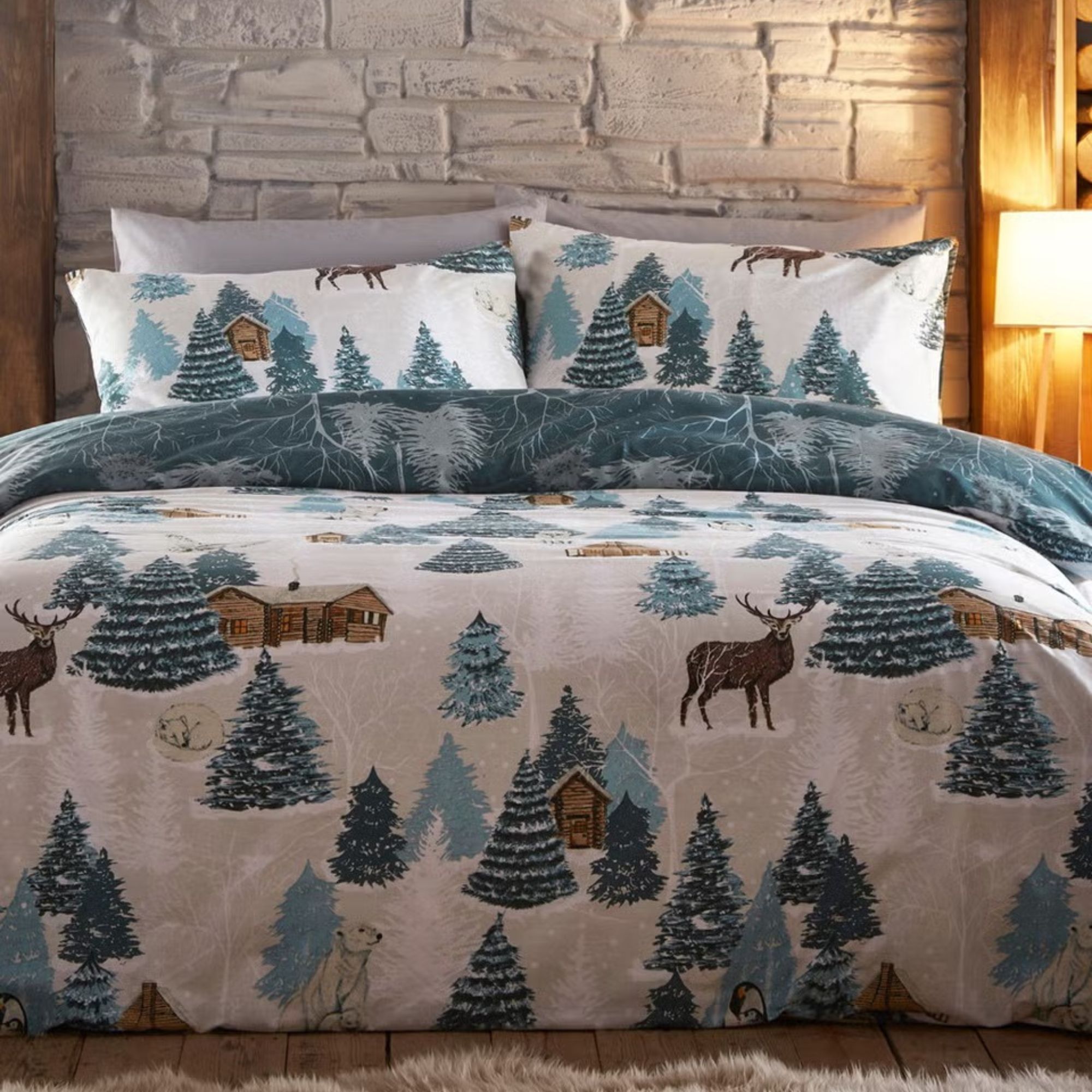 christmas bedding with trees and reindeer on it
