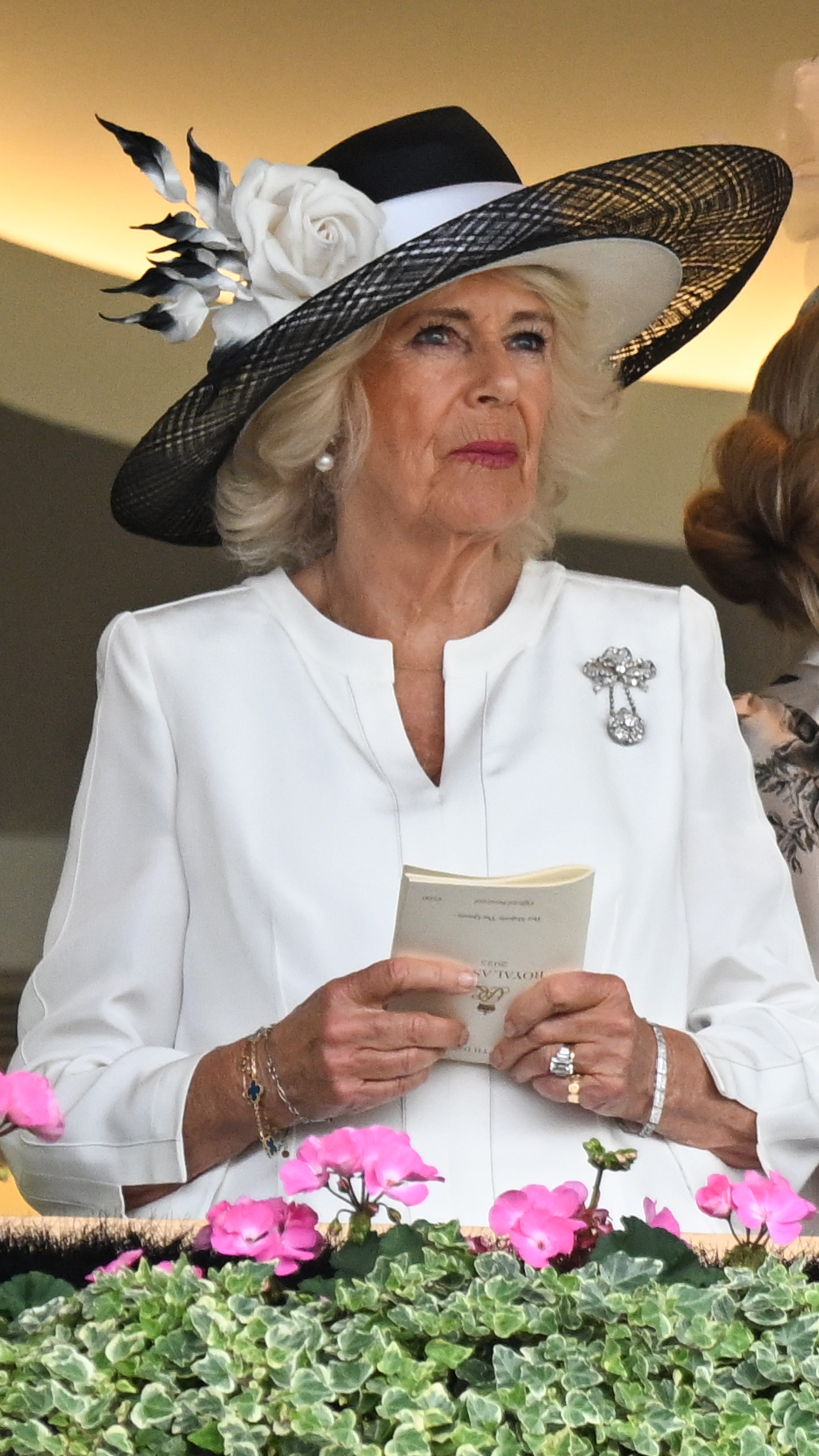 Queen Camilla watches a race on day five of Royal Ascot at Ascot Racecourse on June 21, 2025