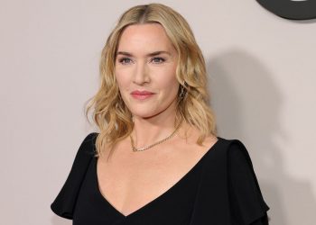 Kate Winslet puts a bold twist on classic pinstripe suits