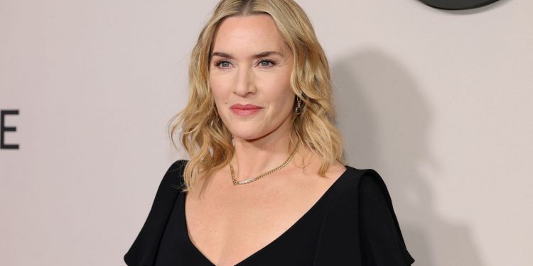 Kate Winslet puts a bold twist on classic pinstripe suits