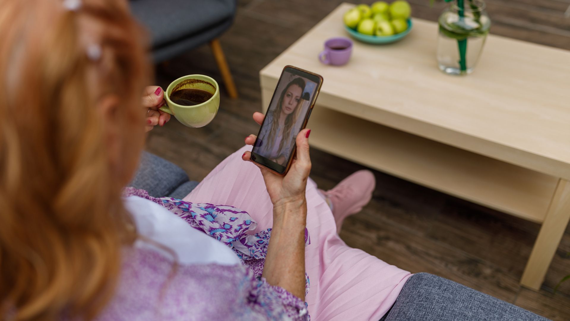 A woman video calling her daughter