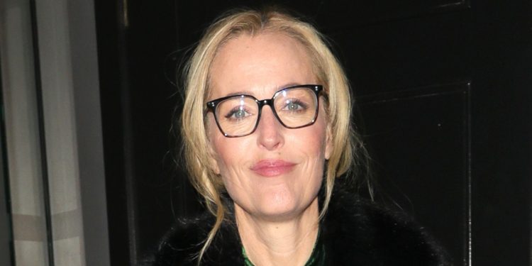 Gillian Anderson wears this season’s big velvet dress trend