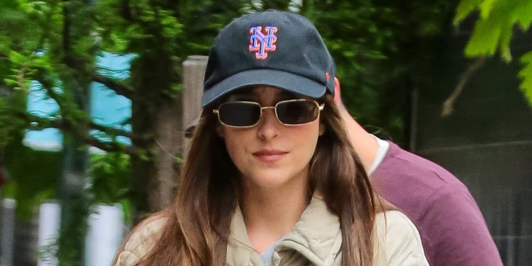 Dakota Johnson’s low-key outfit formula of jeans and trainers