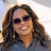 Oprah Winfrey wears ME+EM camel trousers and cerulean blouse