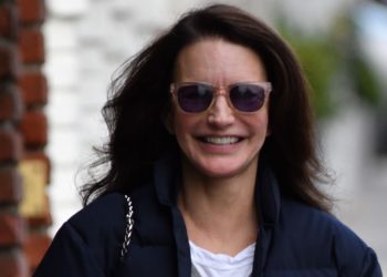 Kristin Davis wears UGG-style boots and skinny jeans