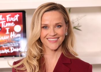 The iconic lip oil inside Reese Witherspoon’s beauty bag